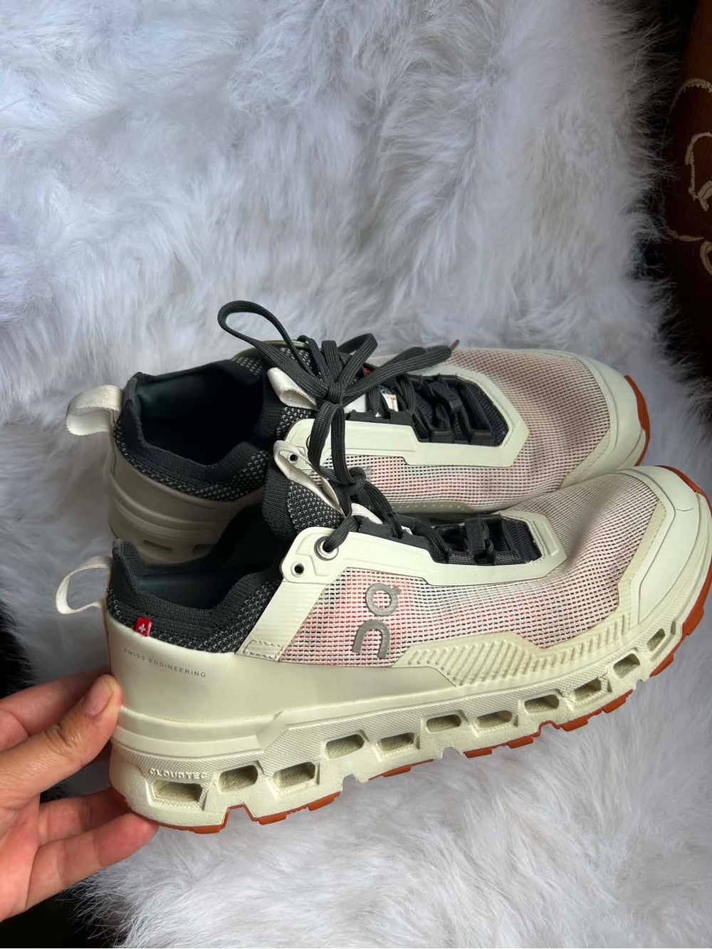 On Running gray and cream athletic sneaker